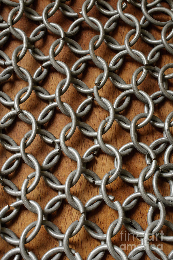 Pattern of metal rings Photograph by Edward Fielding