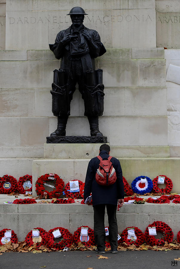Paying Respect Photograph by John Meader