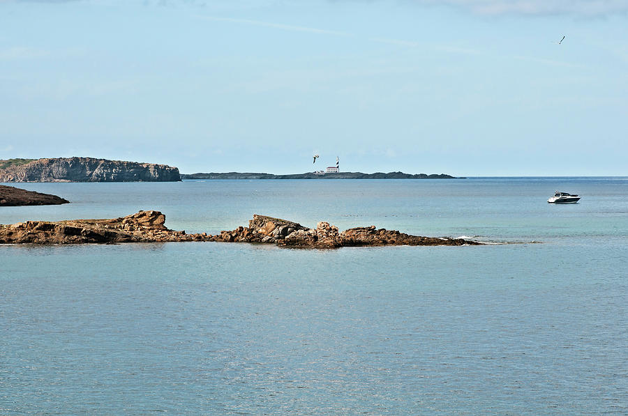 Peaceful Sea Under Lighthouse Watch Photograph