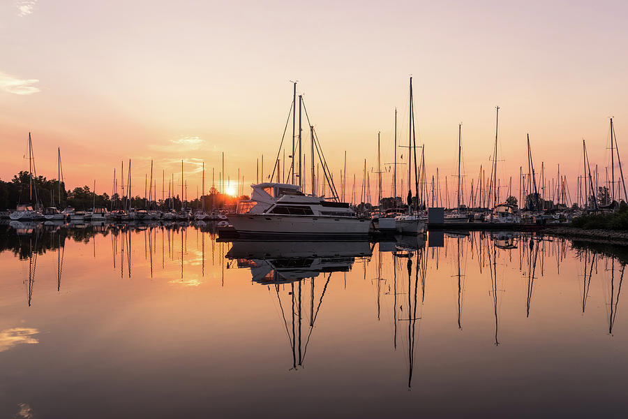 Peaceful Symmetry - Catching the Sunrise at the Yacht Club Photograph by Georgia Mizuleva