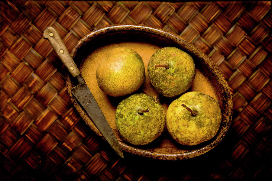 Pears and dish Photograph by John Pagliuca