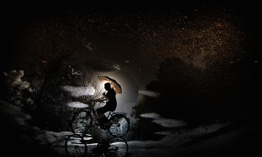 Puddle Photograph - Pedaling By Bicycle... by Antonio Grambone