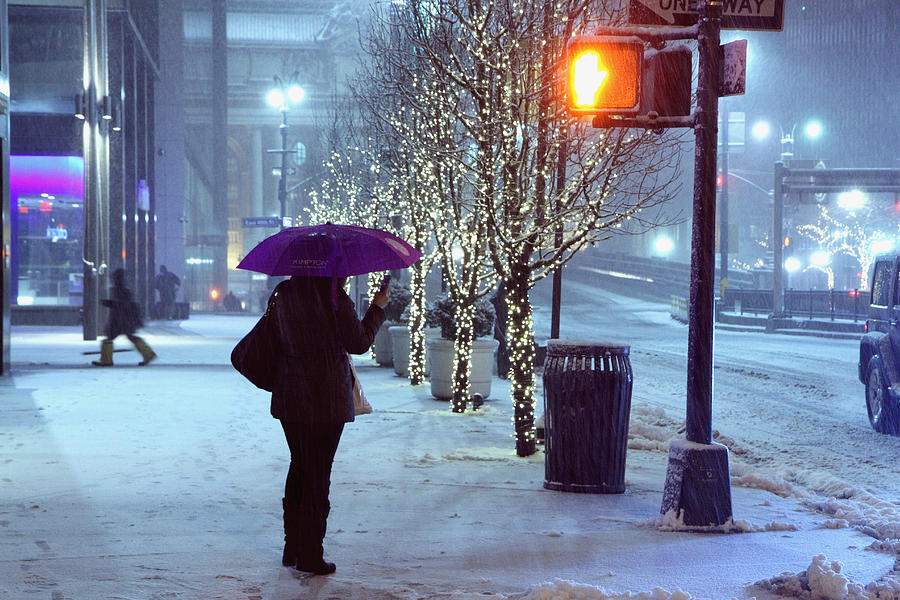 Umbrella Photograph - Pedestrian on Park Avenue near Grand Central in the winter storm late night New York NY by Alexander Winogradoff