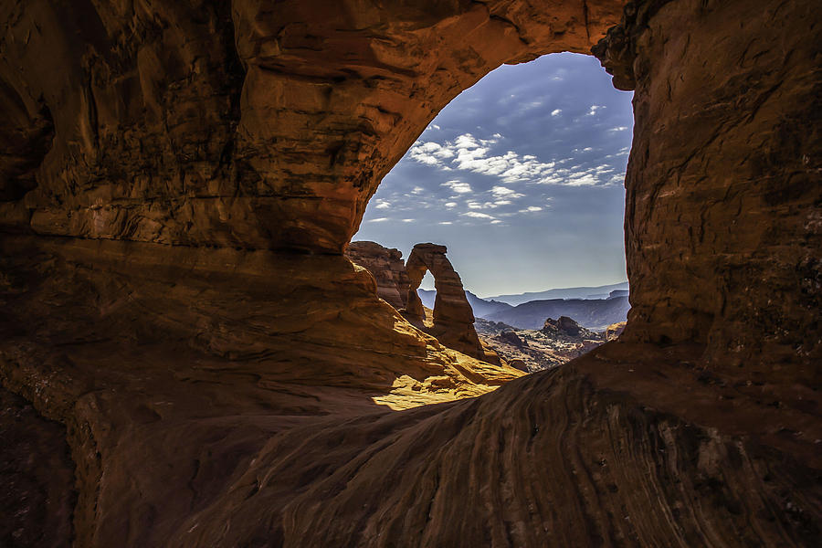 Peeking Through a Sandstone Keyhole Photograph by Doug Scrima