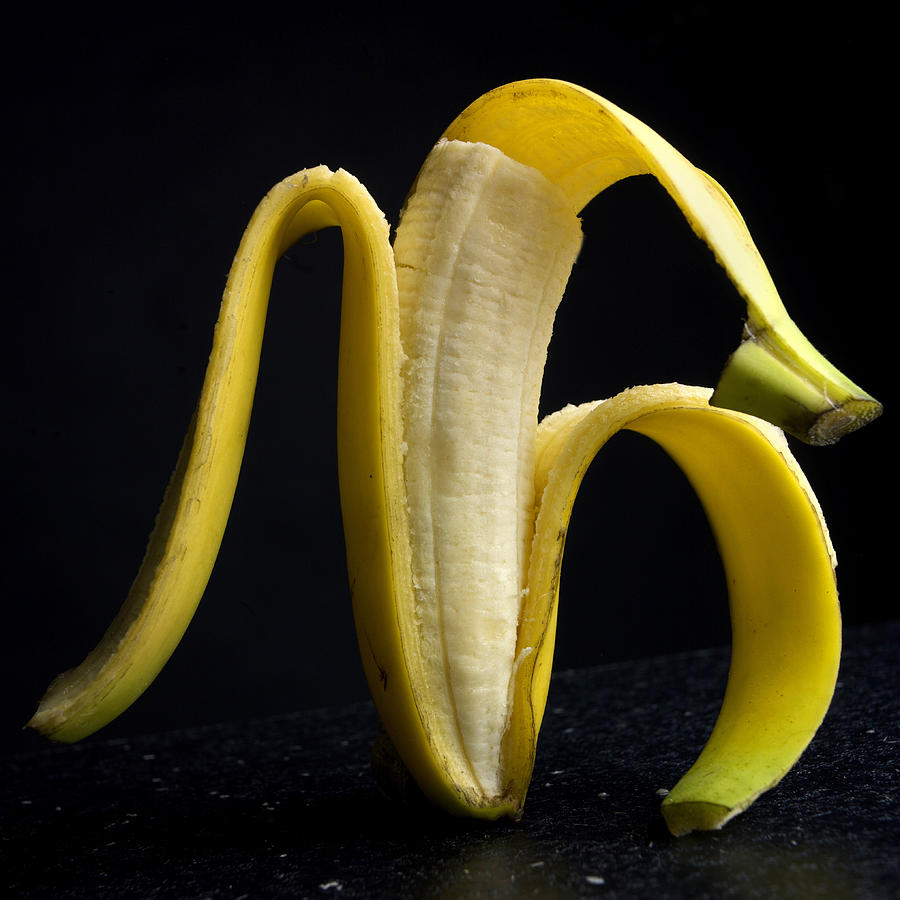 Fruit Photograph - Peeled banana. by Bernard Jaubert