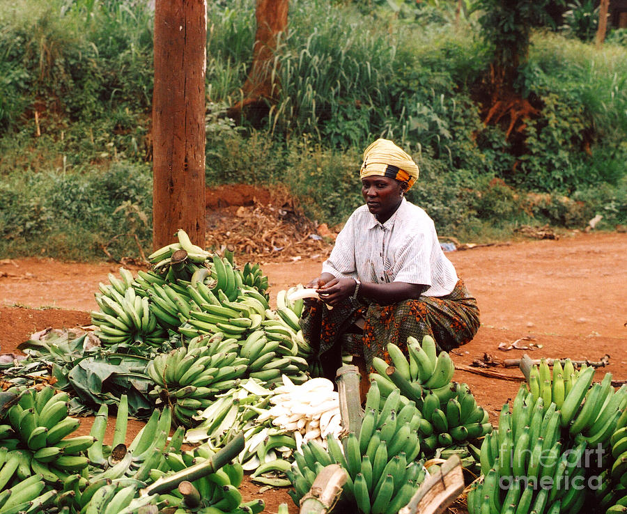 Peeling Bananas at Market Photograph by Andrea Simon