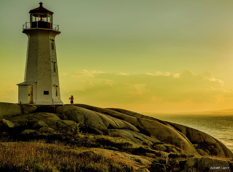 Peggys Cove Lighthouse at Sunset  Photograph by Ken Morris