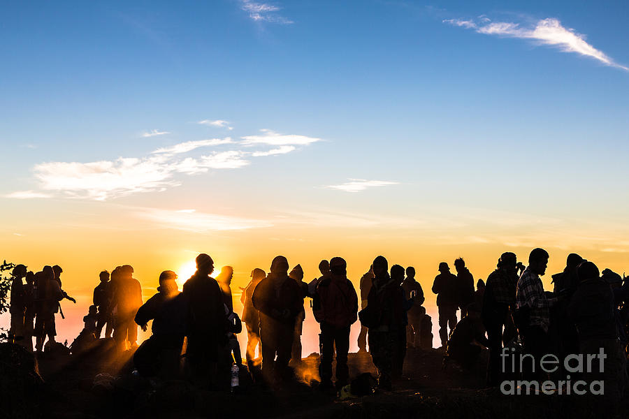 People enjoys the sunrise on the top of Merbabu volcano in Indon Photograph by Didier Marti