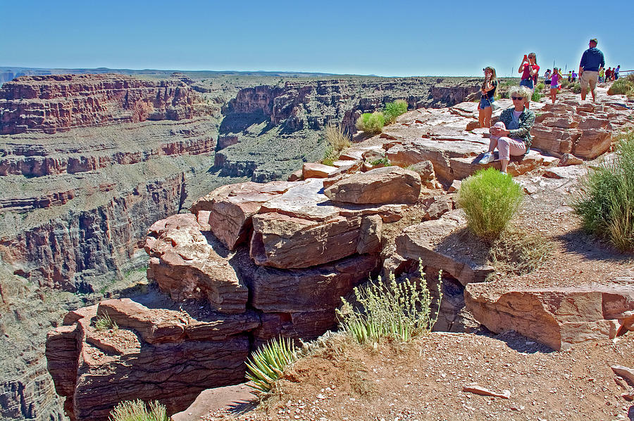 People on the Rocks at Eagle Point in Grand Canyon West, Arizona  Photograph by Ruth Hager