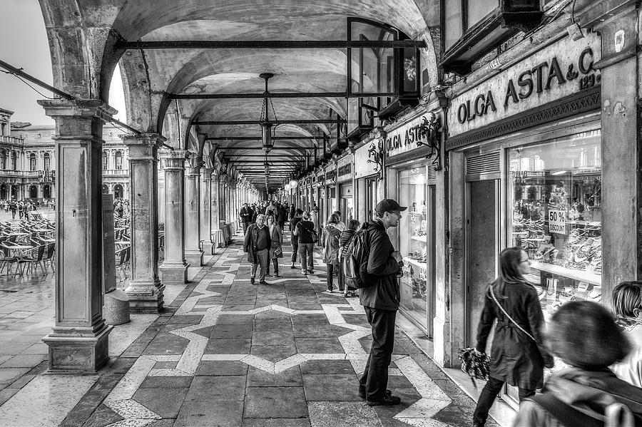 People under the Arcade Photograph by Roberto Pagani