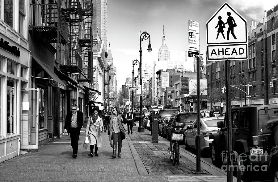 People Walking Ahead in New York City Photograph by John Rizzuto