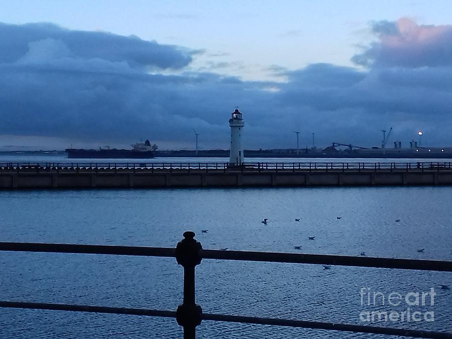 Perch Rock Lighthouse in Blue Photograph by Joan-Violet Stretch