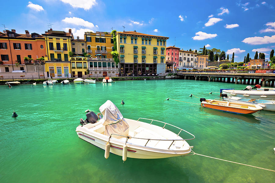 Peschiera del Garda colorful harbor and boats view Photograph by Brch Photography