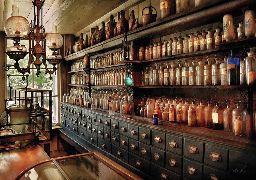 Pharmacy - So many drawers and bottles Photograph by Mike Savad