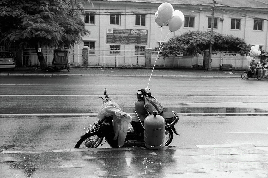 Phnom Penh Balloon Salesman Photograph by Dean Harte