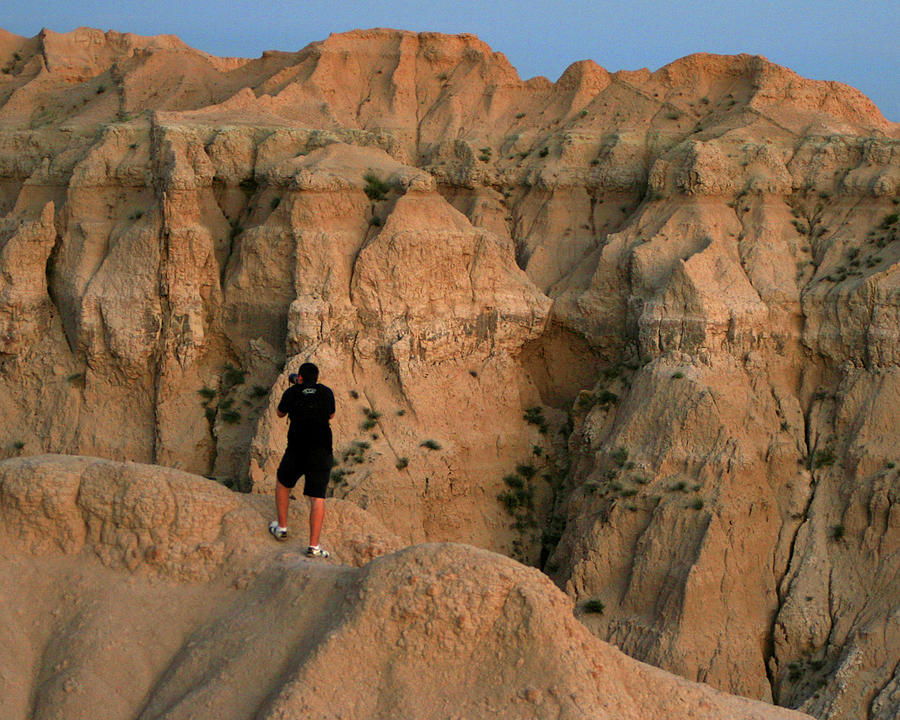 Photographer in the Badlands Photograph by Brook Burling