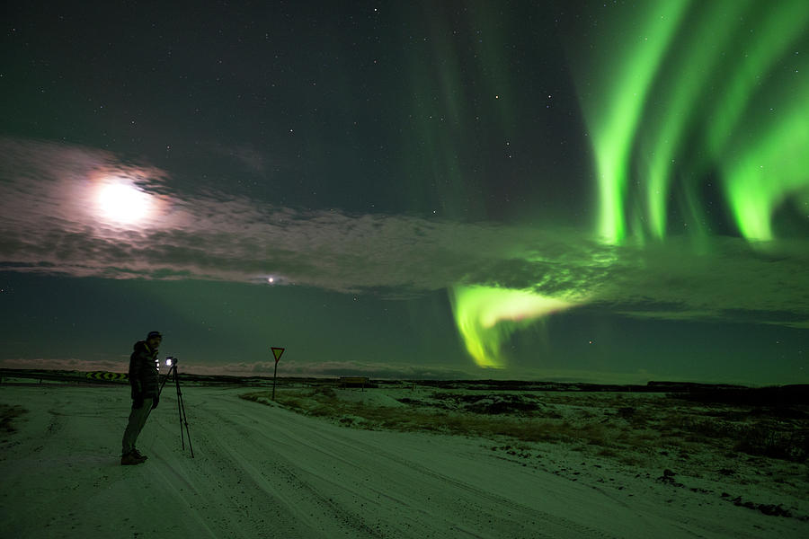 Photographer under the Northern light Photograph by Dubi Roman