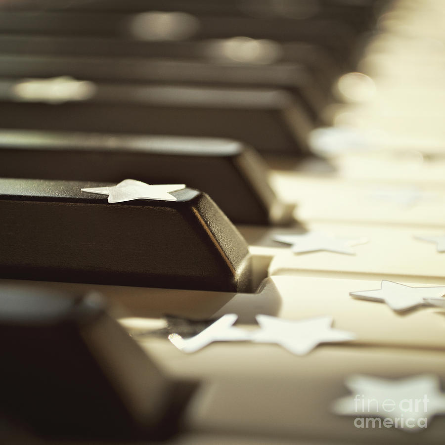 Piano keys and stars Photograph by Lyn Randle