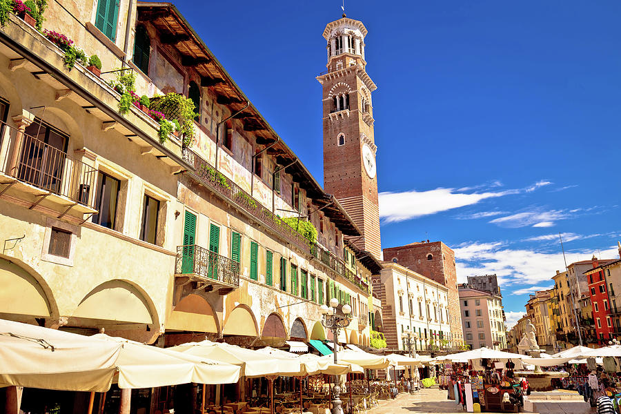 Piazza delle Erbe in Verona street and market view with Lamberti Photograph by Brch Photography