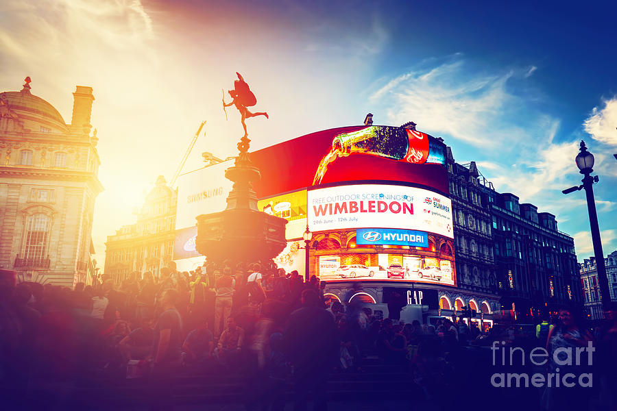 Piccadilly Circus neon ads glow at sunset, young night. London, UK Photograph by Michal Bednarek