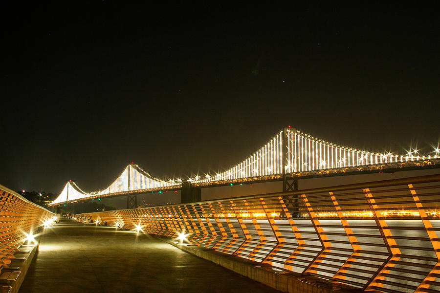 Pier 14 and Bay Bridge Lights Photograph by Bonnie Follett