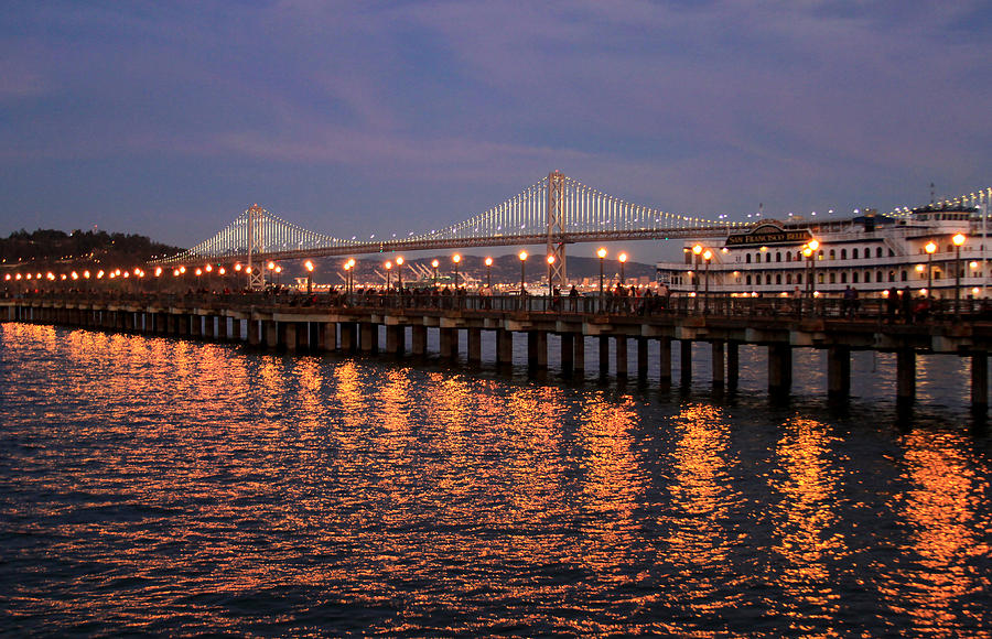 Pier 7 and Bay Bridge Lights at Sunset Photograph by Bonnie Follett