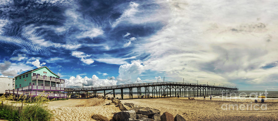 Pier Clouds Photograph by DJA Images