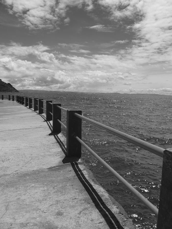 Black And White Photograph - Pier in Peru by Charlotte Talwar