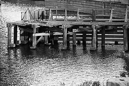 Pier in the Lower Charles Basin Photograph by Allan Morrison