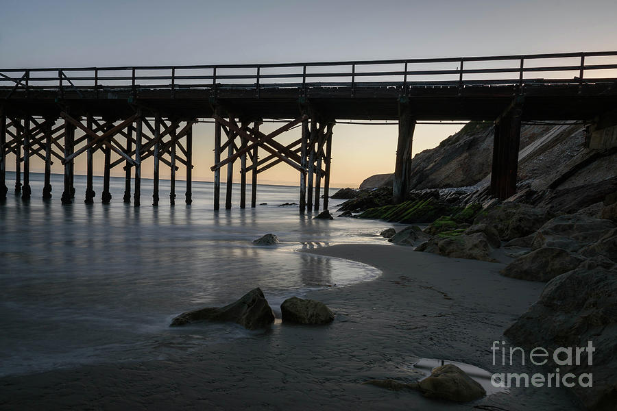 Pier Solitude Photograph by Jeff Hubbard