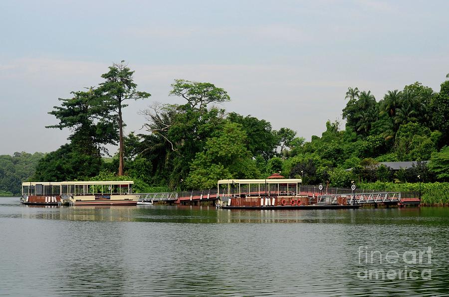 Pier with tourist boats for River Safari Cruise Singapore Photograph by Imran Ahmed