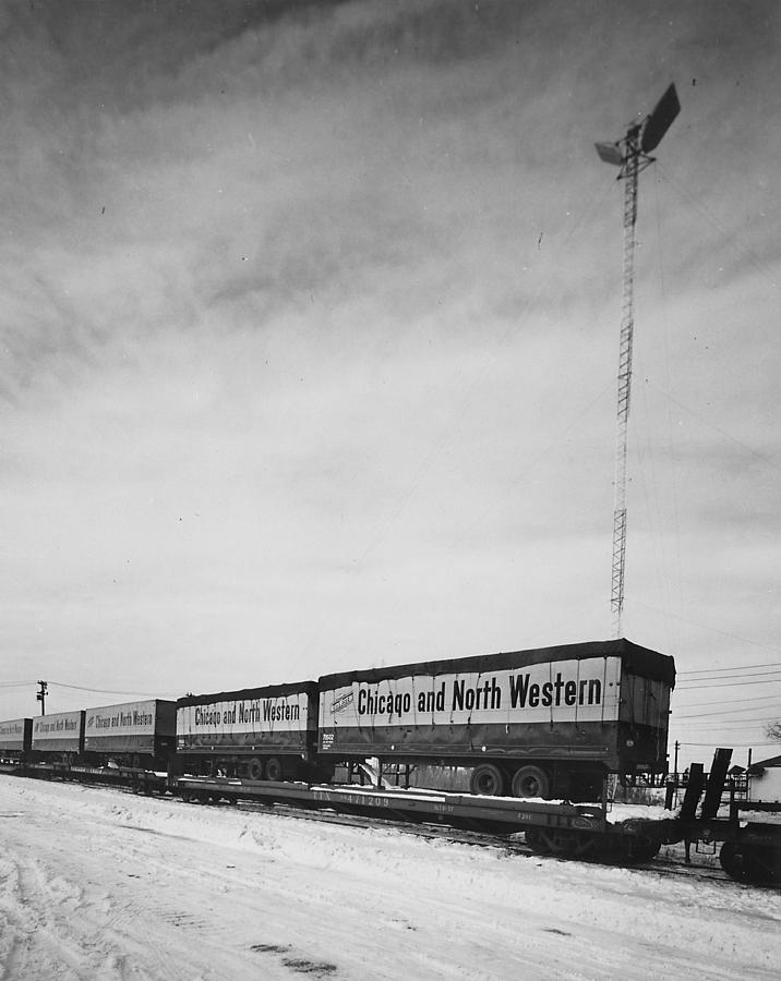 Piggyback Train Passing Microwave Antenna in Proviso Yard Photograph by Chicago and North Western Historical Society
