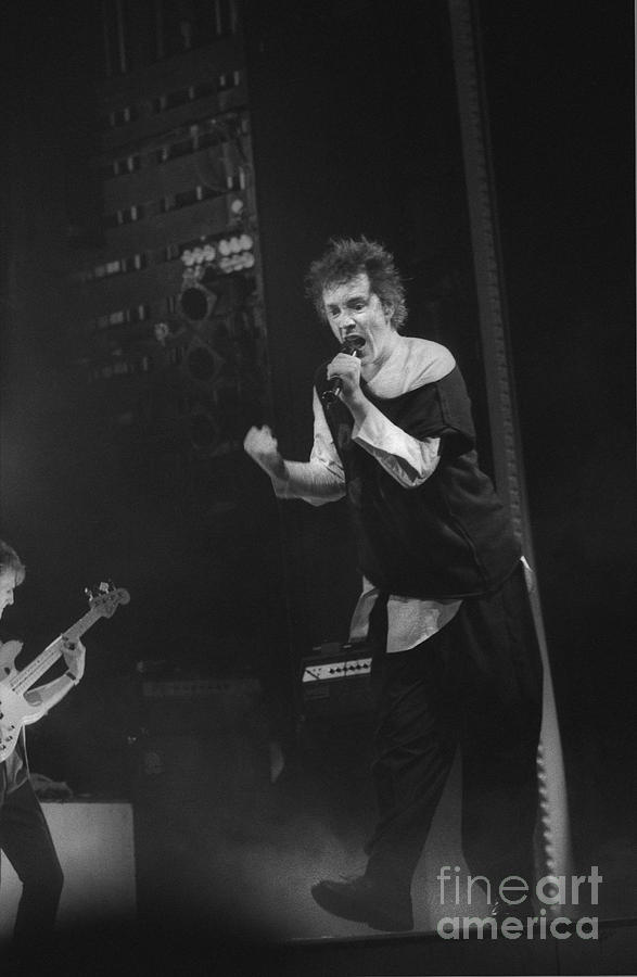 PIL Johnny shaking his fist Photograph by Philippe Taka