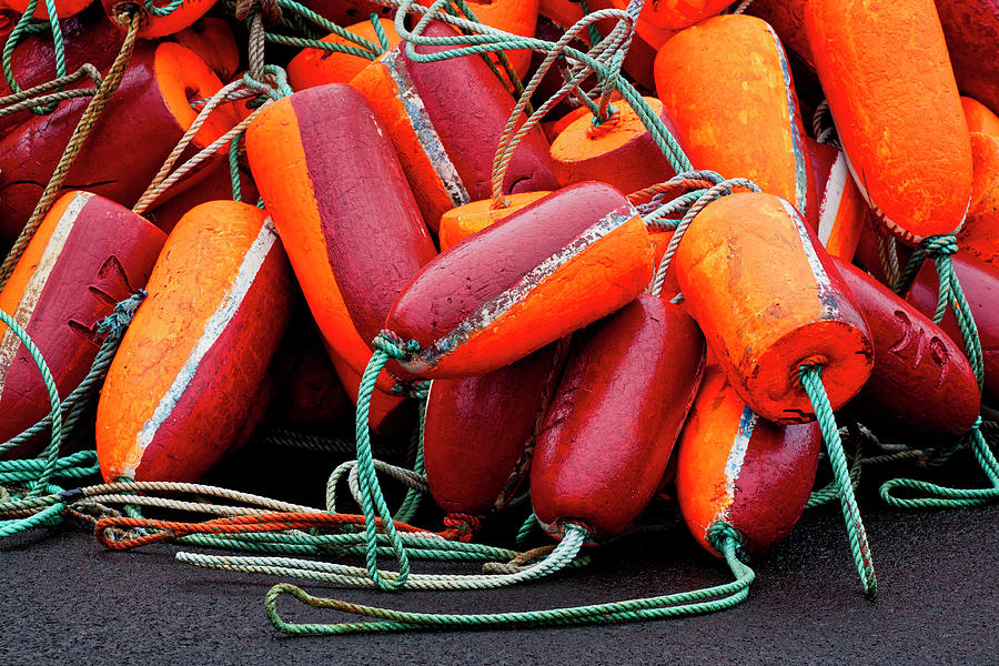 Pile of Fishnet Buoys Orange and Red Photograph by Carol Leigh