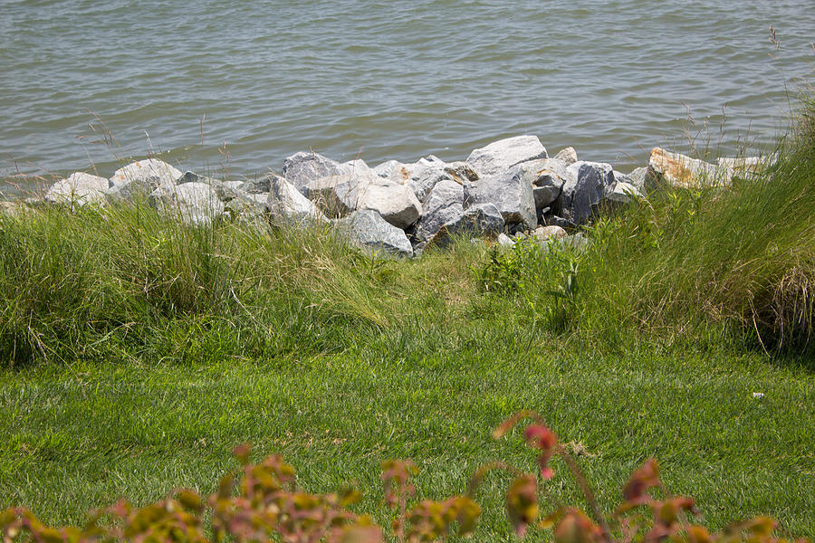 Pile Of Rocks On Shoreline Photograph by Chris W Photography AKA Christian Wilson