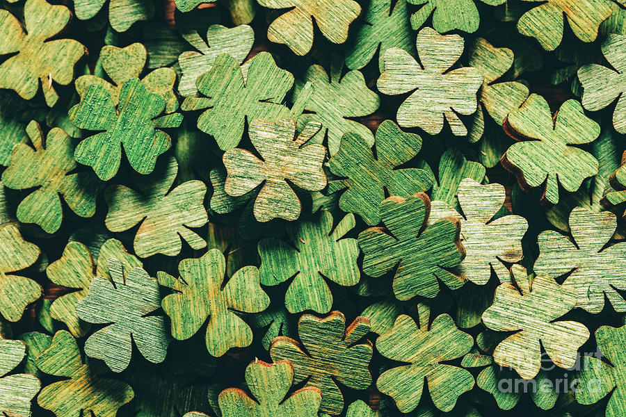 Nature Photograph - Pile of wooden green four-leaf clovers by Michal Bednarek