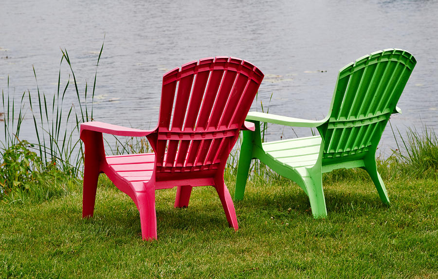 Pink and Green Lounging Chairs by the Lake Photograph by Louise Heusinkveld