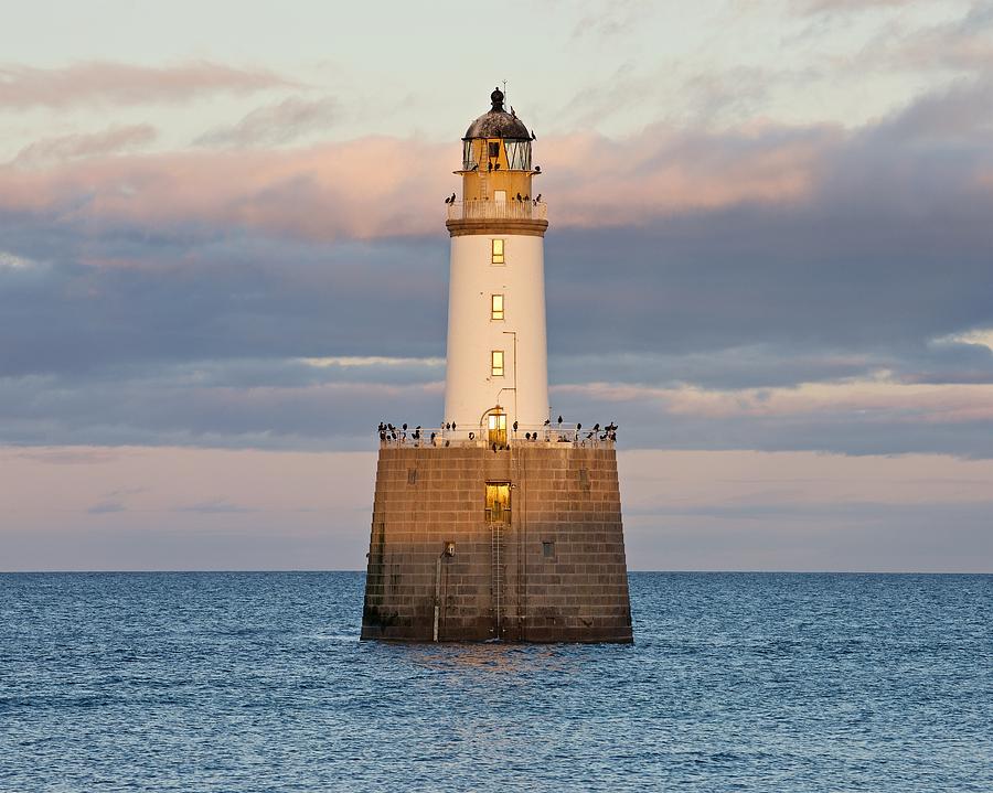 Pink Clouds Above Rattray Head Lighthouse Photograph by Stephen Taylor