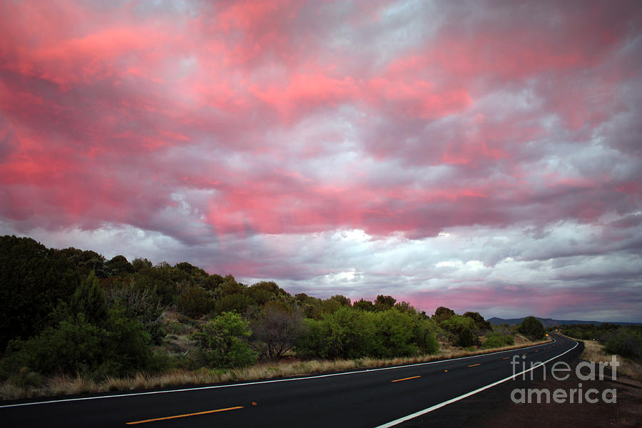 Pink Clouds over Arizona Photograph by Carol Groenen