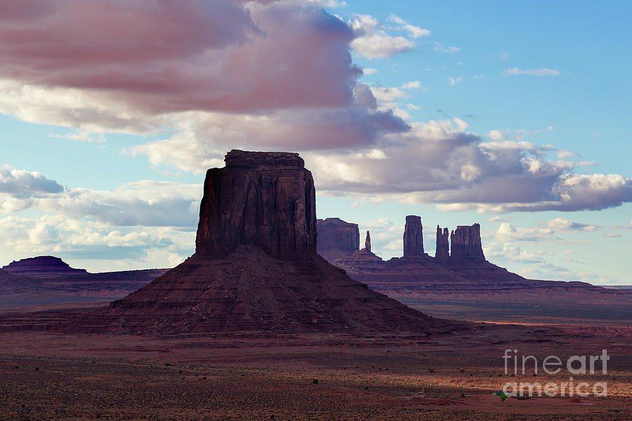 Pink Clouds Over Monument Valley Photograph by Mimi Ditchie