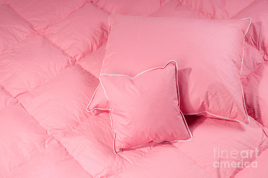 Pink cotton fluff two pillows on big duvet  Photograph by Arletta Cwalina