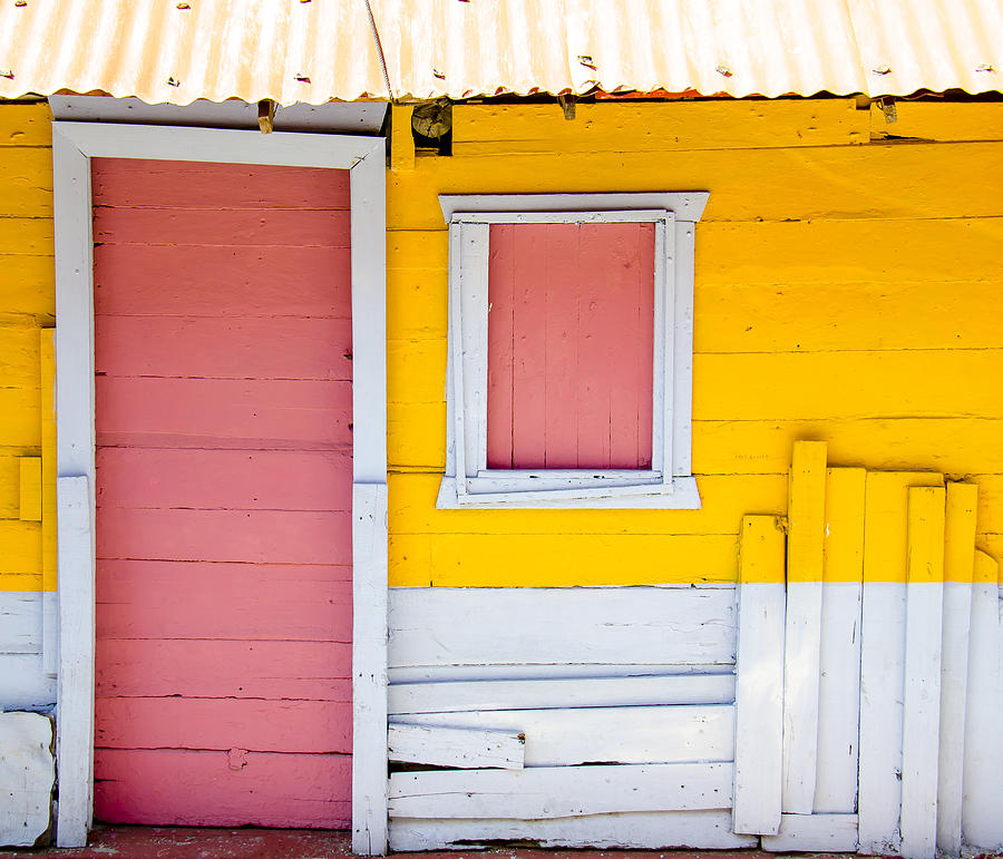 Pink Door Yellow House Photograph By Denny Motsko