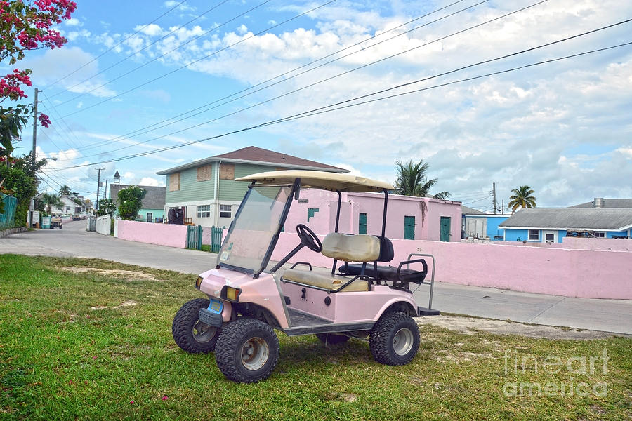 Pink Golf Cart in the Bahamas Photograph by Catherine Sherman