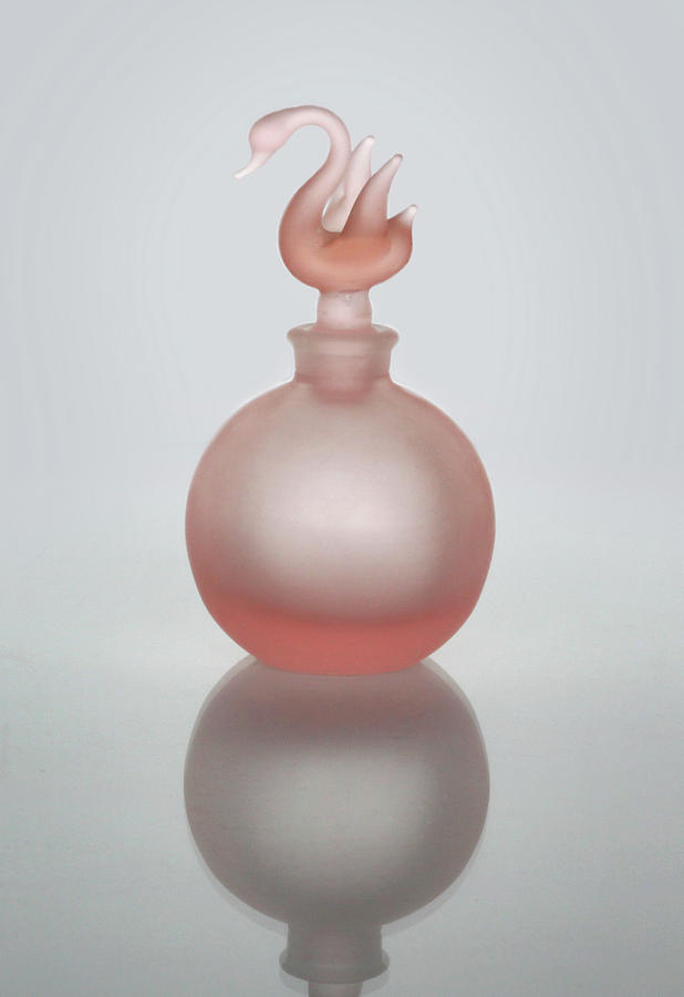 Pink Perfume Bottle Vertical Photograph by David and Carol Kelly