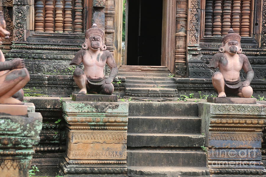 Pink Sandstone Monkeys 10th Century UNESCO site Cambodia  Photograph by Chuck Kuhn