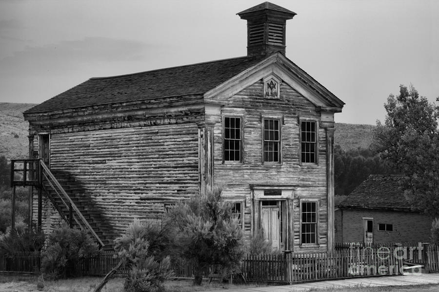 Pink Skies Over The Bannack School House Black And White Photograph by Adam Jewell