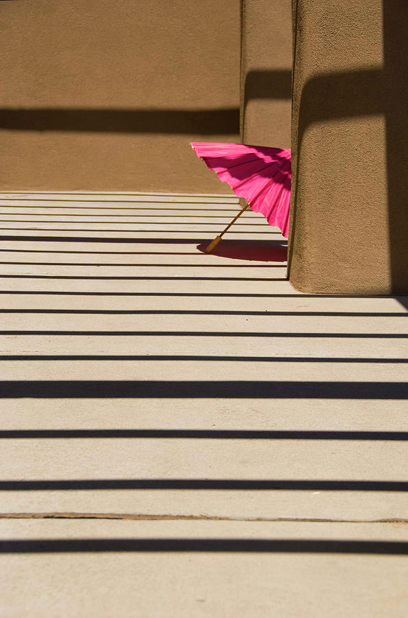 Pink umbrella Photograph by Carolyn DAlessandro