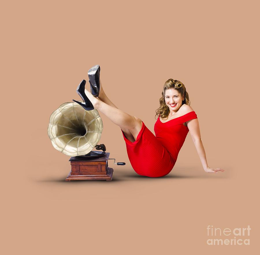 Pinup girl in red dress playing classical music Photograph by Jorgo Photography