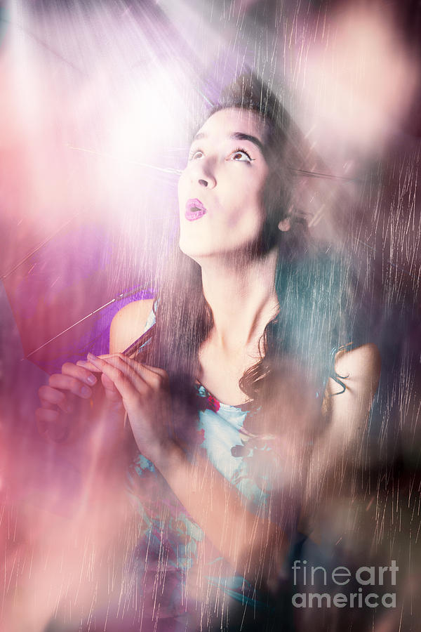 Pinup woman mesmerised by pouring down rainfall Photograph by Jorgo Photography