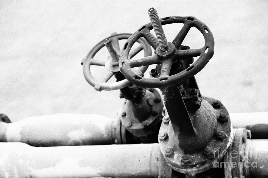 Black And White Photograph - Pipeline valves by Gaspar Avila